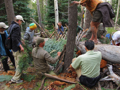 The beginnings of a mountain survival shelter