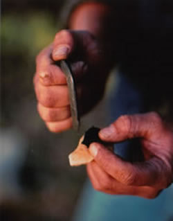 Starting a fire with flint and steel